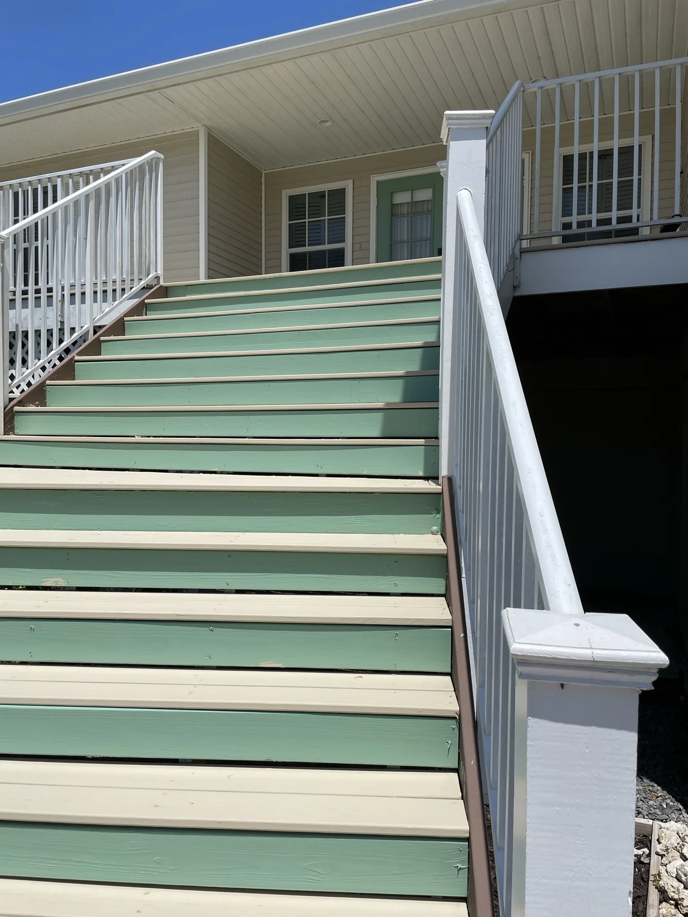 Finished Royal Renovations exterior deck stairs and railings