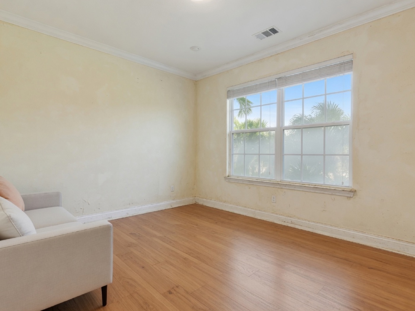 Illustrative living room before a professional interior repaint