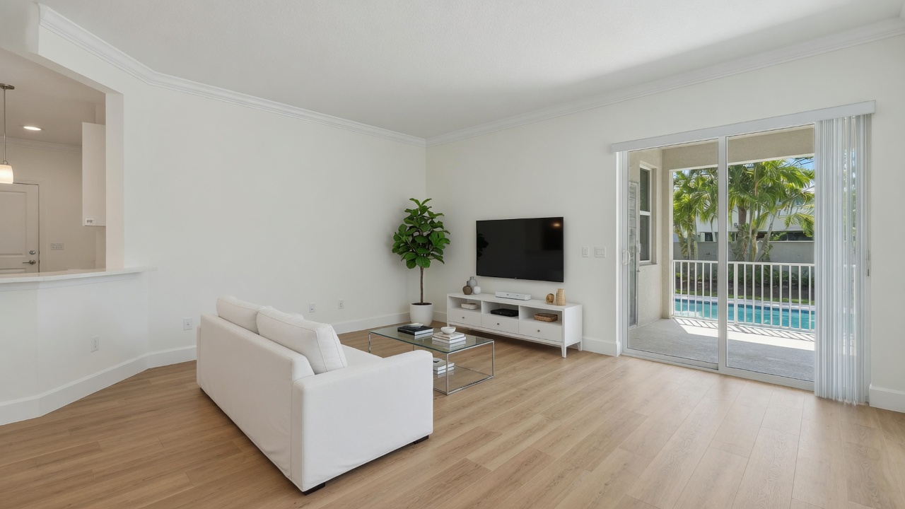 Finished living room with clean painted walls, ceiling and trim