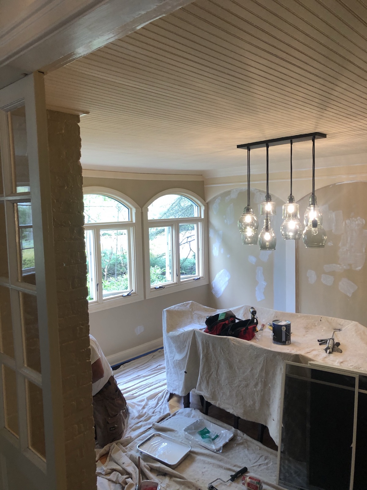Royal Renovations dining room during preparation and painting