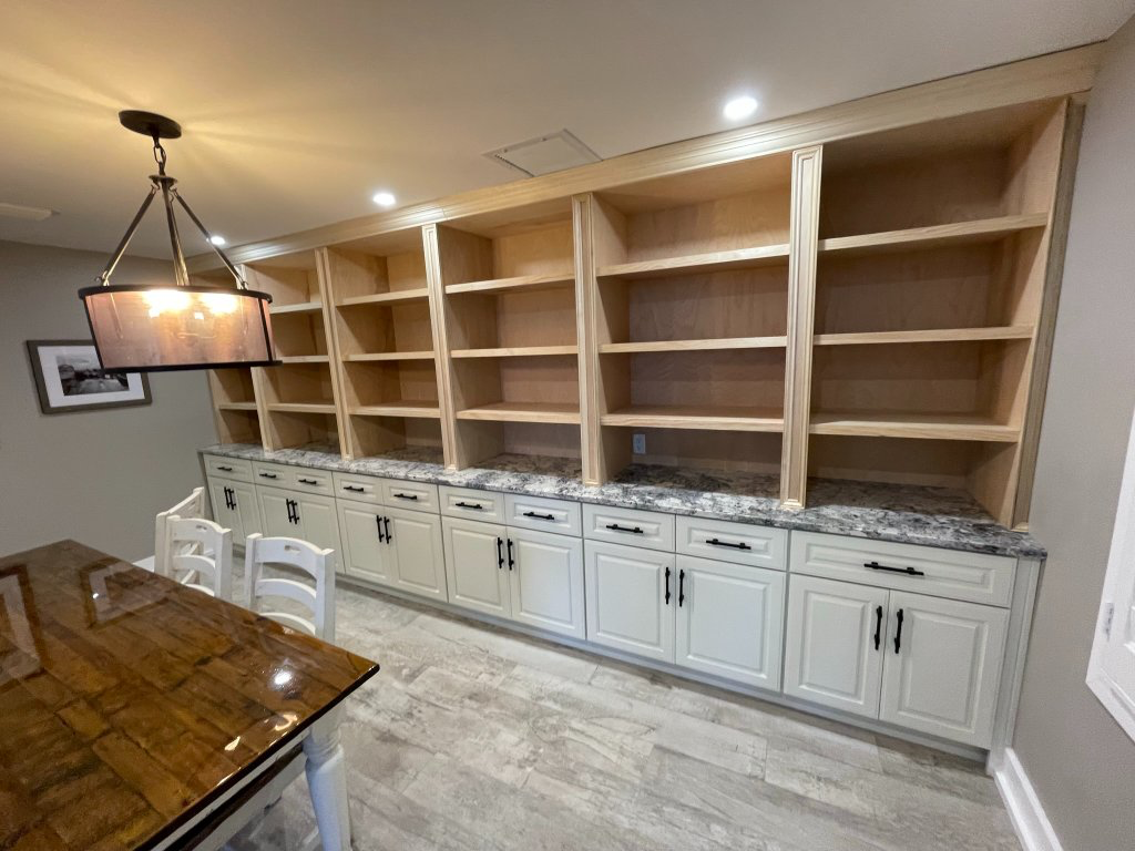 Custom built-ins with painted cabinets and open shelving