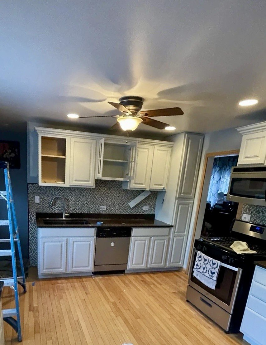 Smooth painted kitchen cabinet finish