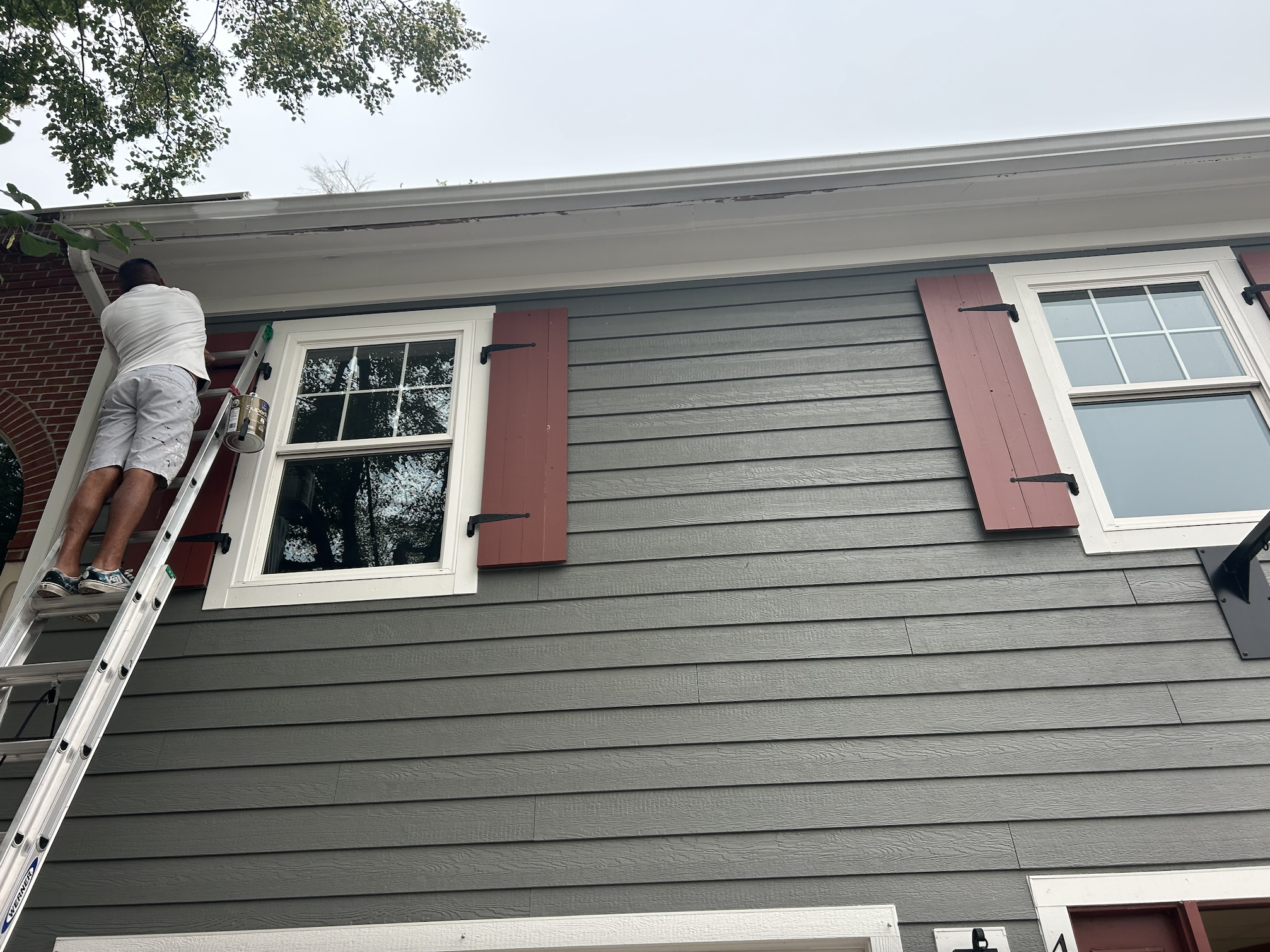Small commercial exterior painting with trim detail