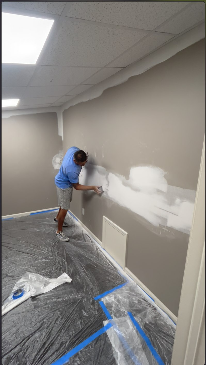 Drywall repair and patching in progress
