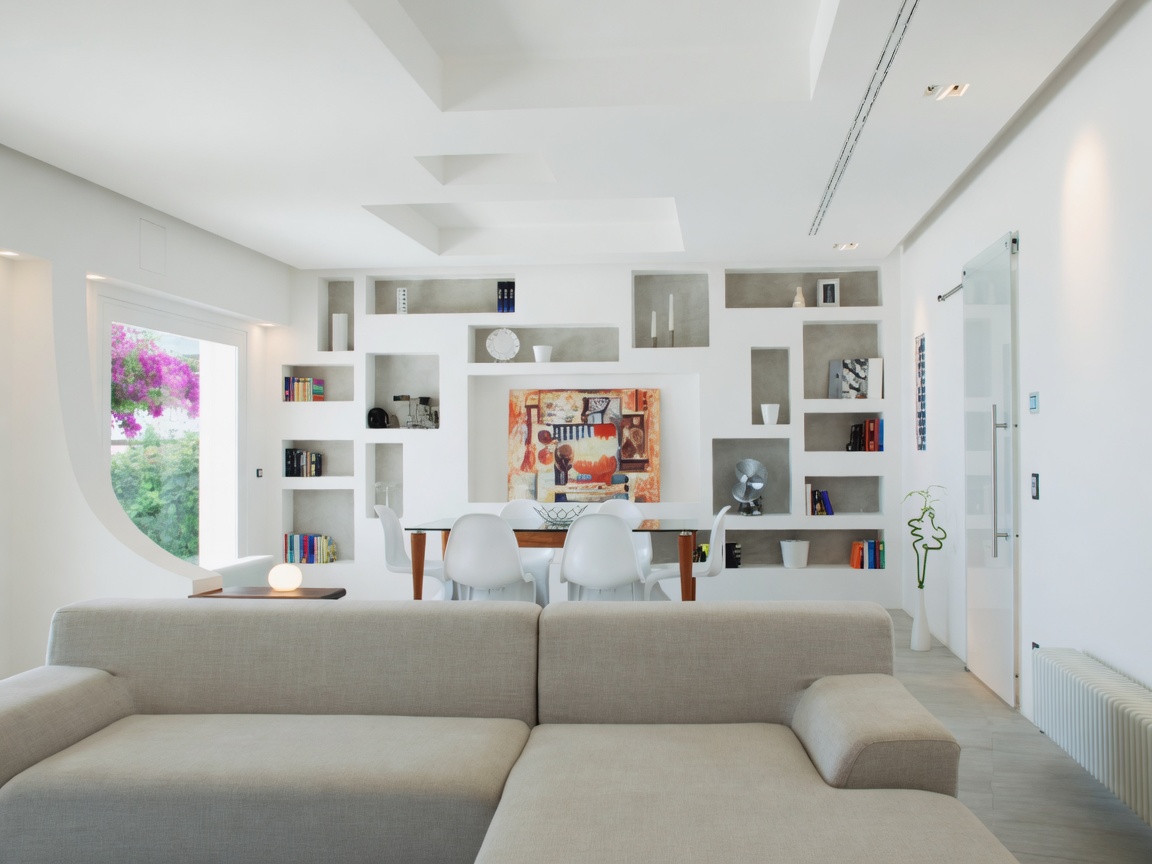 Modern white residential room with drywall wall niches