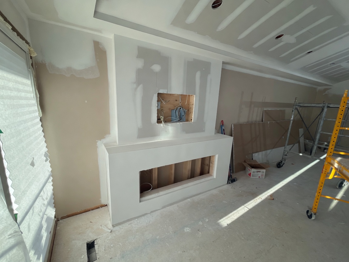 Custom residential media wall drywall build-out