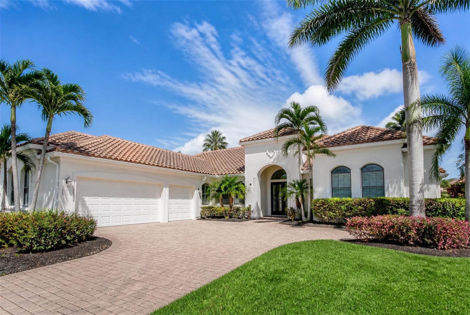 Finished Southwest Florida home with tile roof and landscaping
