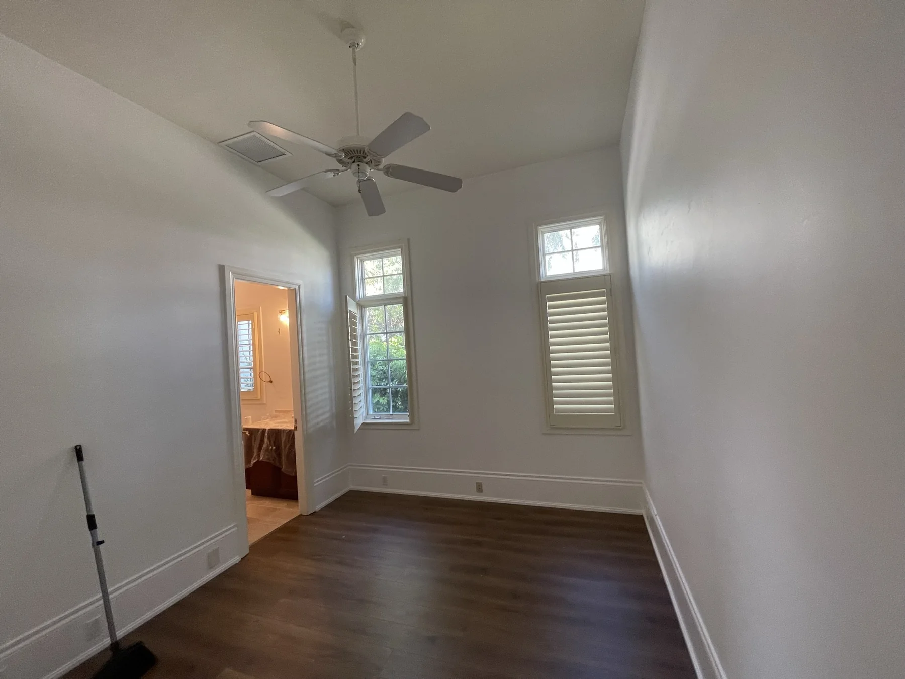 Interior trim and baseboard detail after repainting